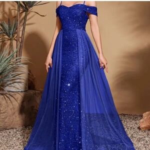 Elegant Blue Off-Shoulder Sequinned Evening Gown with Tull
